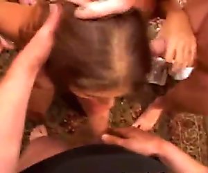 Dirty Brunette Handles Cocks At Tampa Area Gangbang