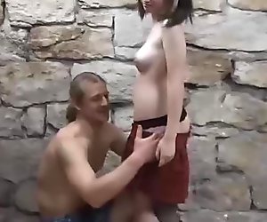 Schoolgirl posing naked with a stranger
